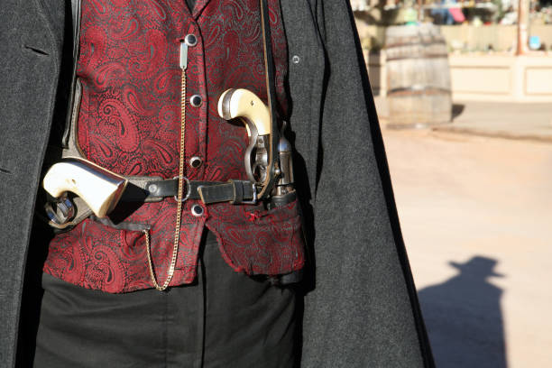 Custom cowhide holster with a firearm, showcasing its security, comfort, and craftsmanship, emphasizing the durability and personalized fit of leather holsters for firearms.